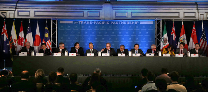 Lãnh đạo 12 nước tại buổi họp báo sau khi kết thúc đàm phán TPP tại thành phố Atlanta - Mỹ - Ảnh: AFP