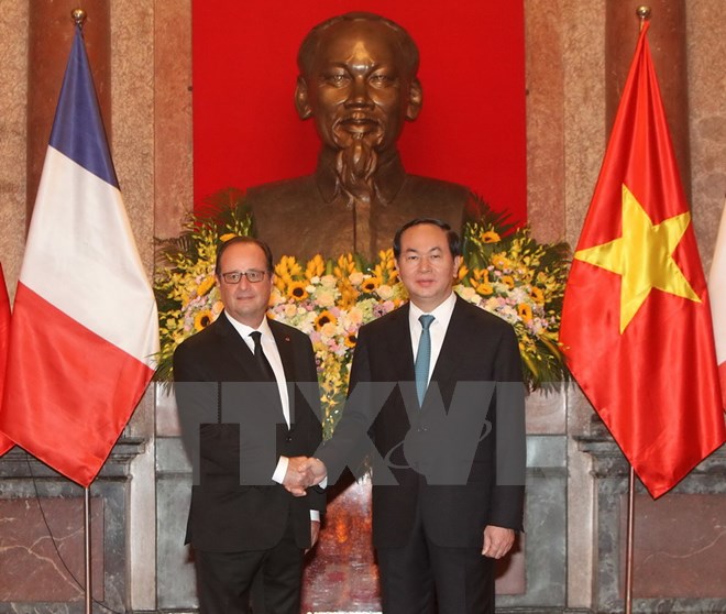 Chủ tịch nước Trần Đại Quang v&agrave; Tổng thống Ph&aacute;p Francois Hollande tại Lễ đ&oacute;n