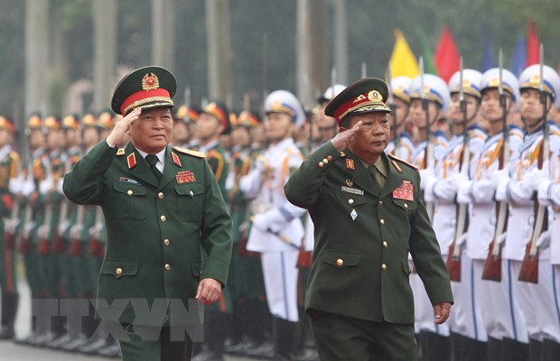 Bo truong Bo Quoc phong Lao tham, lam viec tai Viet Nam hinh anh 1