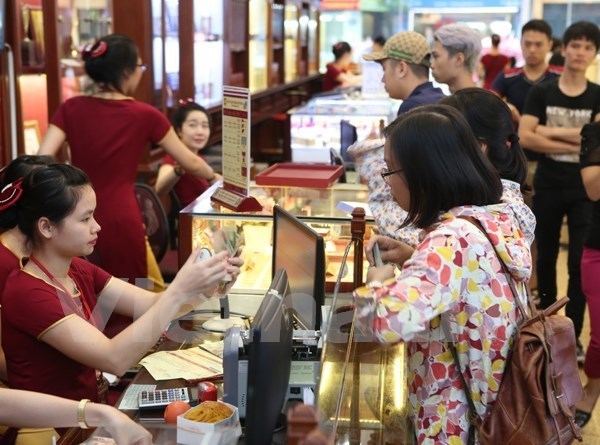 Gia vang ha nhiet va xuong duoi 60 trieu dong moi luong phien dau tuan hinh anh 1