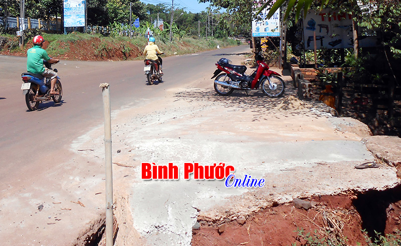 Hố sâu trên QL13 đã được vá nhưng vẫn chưa an toàn