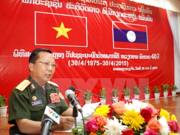 L&agrave;o tổ chức m&iacute;ttinh trọng thể kỷ niệm Chiến thắng 30-4 của Việt Nam