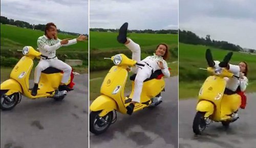 Đi xe máy buông tay quay clip, phạt 6 triệu đồng