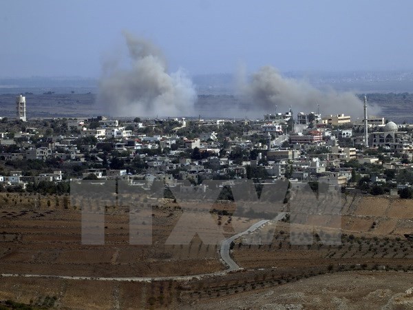 Syria: Xe cứu trợ được phép vào cả vùng quân chính phủ và phiến quân