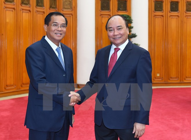 Thủ tướng: Việt Nam sẽ tiếp tục l&agrave;m hết sức m&igrave;nh để gi&uacute;p L&agrave;o