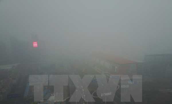 Trung Quốc ô nhiễm nặng, khói mù bao phủ cả miền Bắc