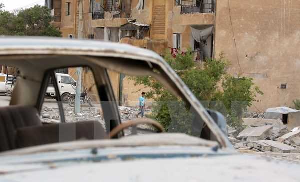 Syria tố Mỹ không kích bằng phốtpho trắng làm hàng chục người chết