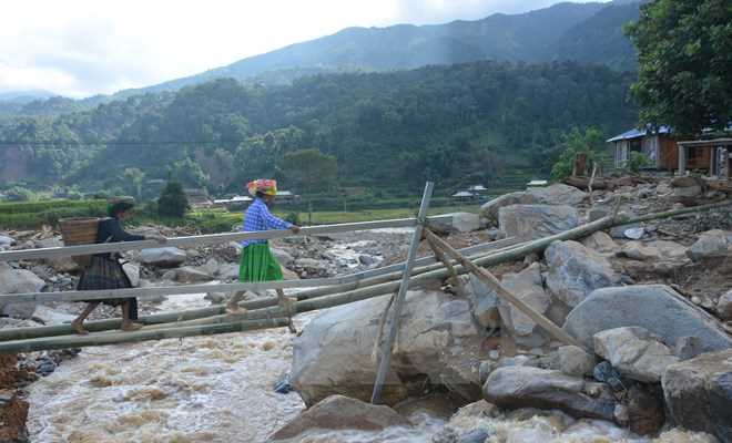 Chủ tịch nước L&agrave;o gửi điện thăm hỏi nạn nh&acirc;n bị ảnh hưởng bởi mưa lũ