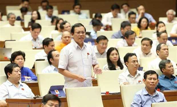 Quốc hội biểu quyết ba luật v&agrave; thảo luận về hai dự &aacute;n luật