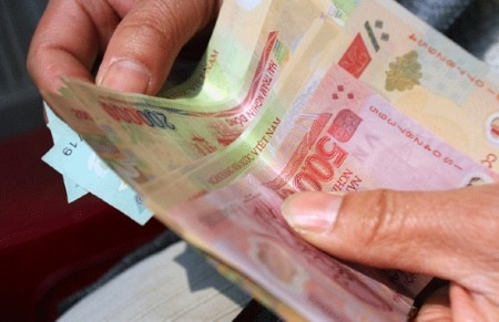 Khi năng suất lao động tăng 1% thì tiền lương tăng 0,8%