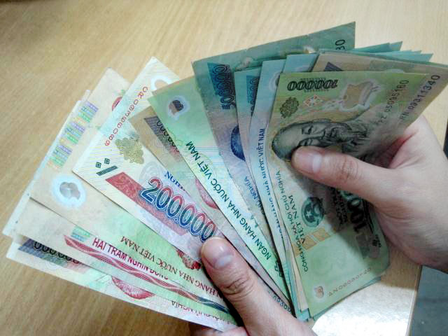 Từ 1-7-2013, mức lương cơ sở sẽ l&agrave; 1.150.000 đồng/th&aacute;ng.