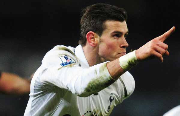 Vượt mặt van Persie, Bale giành “cú ăn ba” danh hiệu