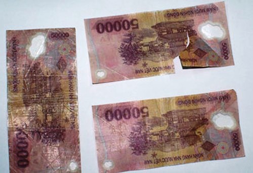 Miễn phí đổi tiền bị hư hỏng