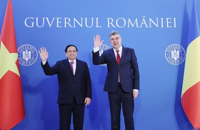 Thủ tướng Phạm Minh Chính và Thủ tướng Romania Ion-Marcel Ciolacu. (Ảnh: Dương Giang/TTXVN) ttxvn_thu tuong VN Romania.jpg