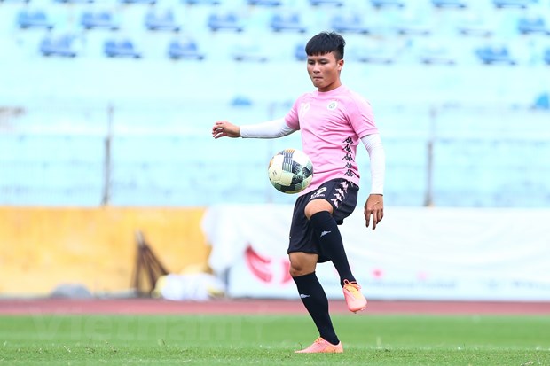 Quang Hai: ‘Duoc an bua com Tet voi gia dinh la dieu am ap nhat’ hinh anh 1