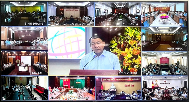 Hội thảo diễn ra dưới hình thức trực tiếp kết hợp trực tuyến, kết nối từ điểm cầu chính tại Hà Nội với các tỉnh, thành trên cả nước. (Ảnh: Đình Toán/Vietnam+) 12b97d45be9b0bc5528a-dxtn.jpg