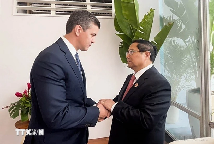 Nhân chuyến tham dự Hội nghị thượng đỉnh G20 tại Rio de Janeiro (Brazil), chiều 19/11/2024, Thủ tướng Phạm Minh Chính gặp Tổng thống Paraguay Santiago Pena. (Ảnh: Dương Giang/TTXVN)